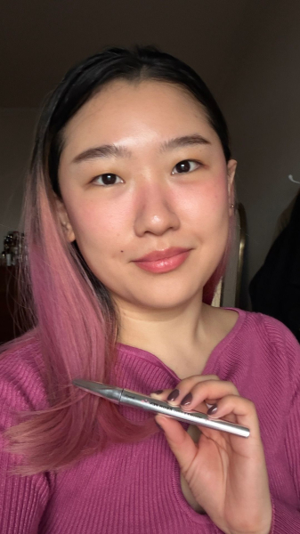 A selfie of Allure commerce editor Sarah Han after applying the Benefit Cosmetics Mighty Fine Brow Pen
